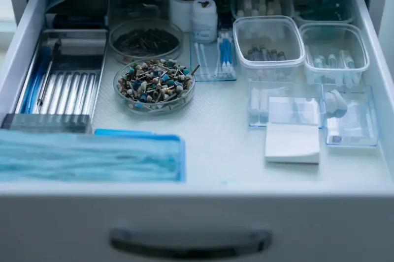 Organized dental tools and equipment in a drawer