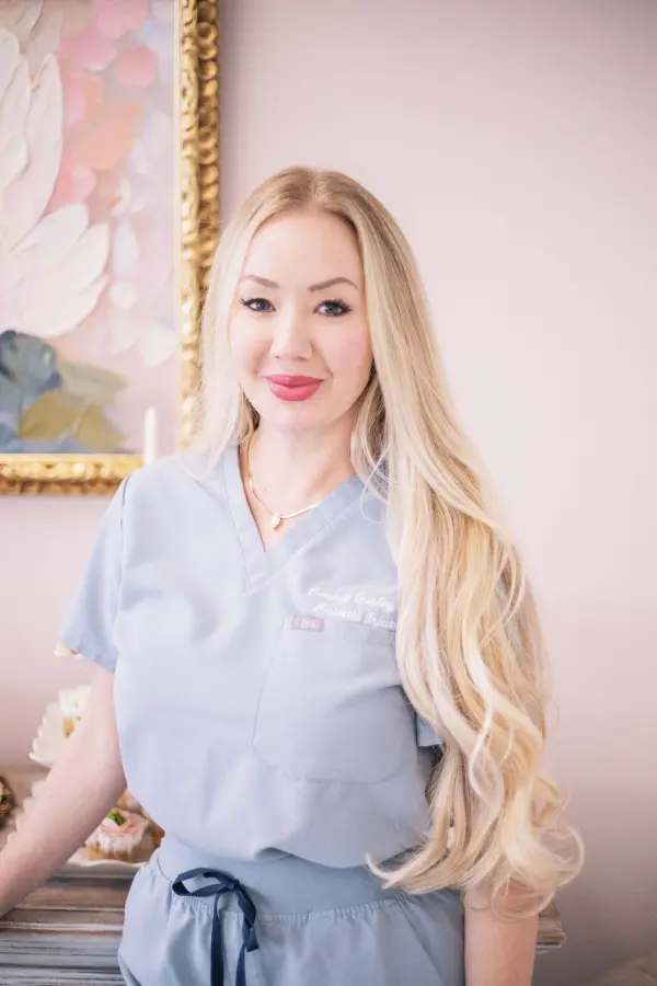 Portrait of an aesthetics professional in scrubs