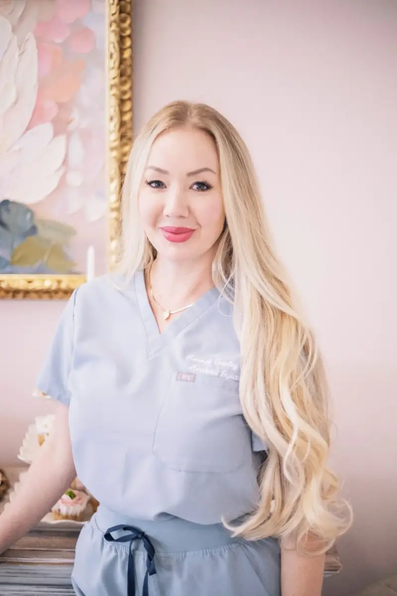 Portrait of an aesthetics professional in scrubs