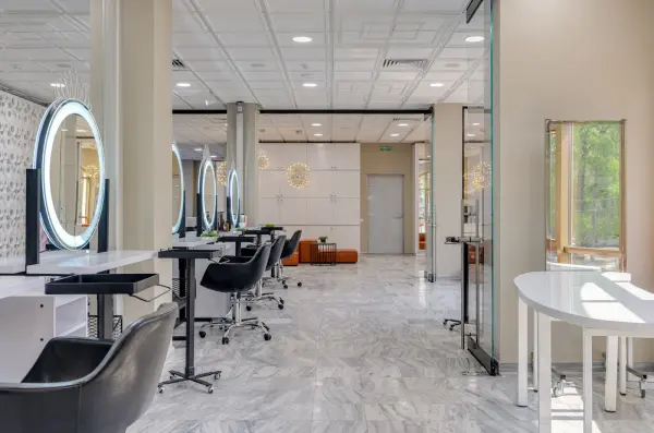 Contemporary salon interior with styling chairs and mirrors