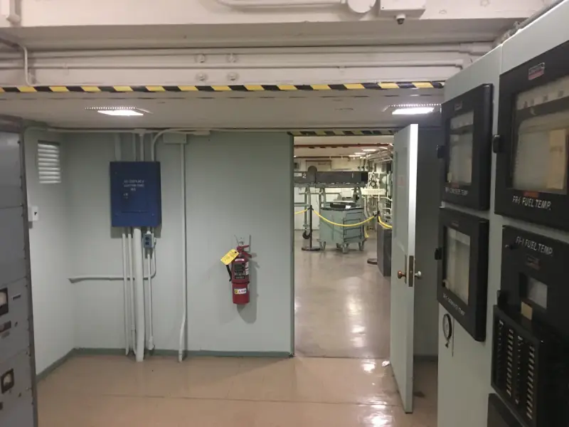 Historic reactor control room with analog dials and switch panels at Oak Ridge