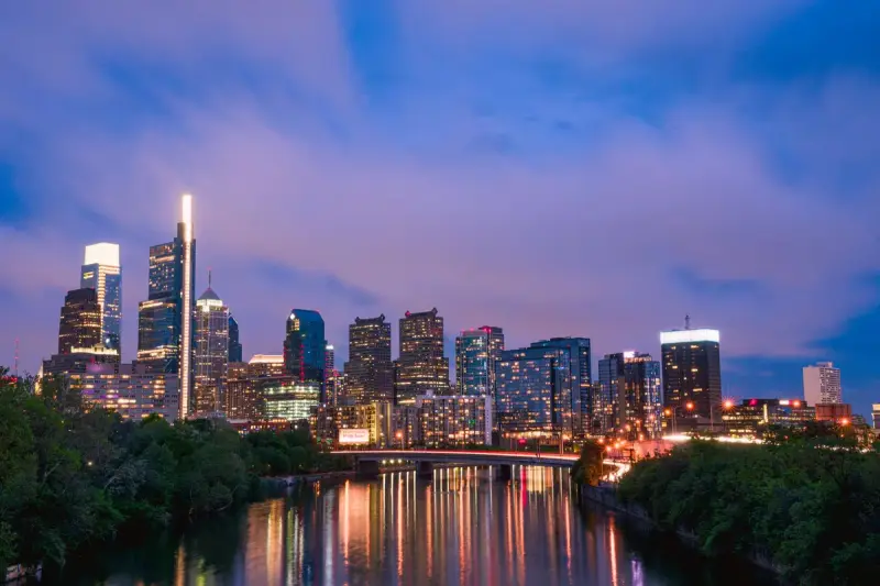 Philadelphia skyline at twilight reflected in the river