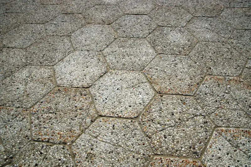 Close-up of hexagonal stone pavers fitted together in a repeating pattern