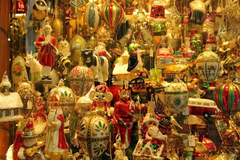 Shop display packed with hand-painted glass Christmas ornaments, figures and hot-air balloons