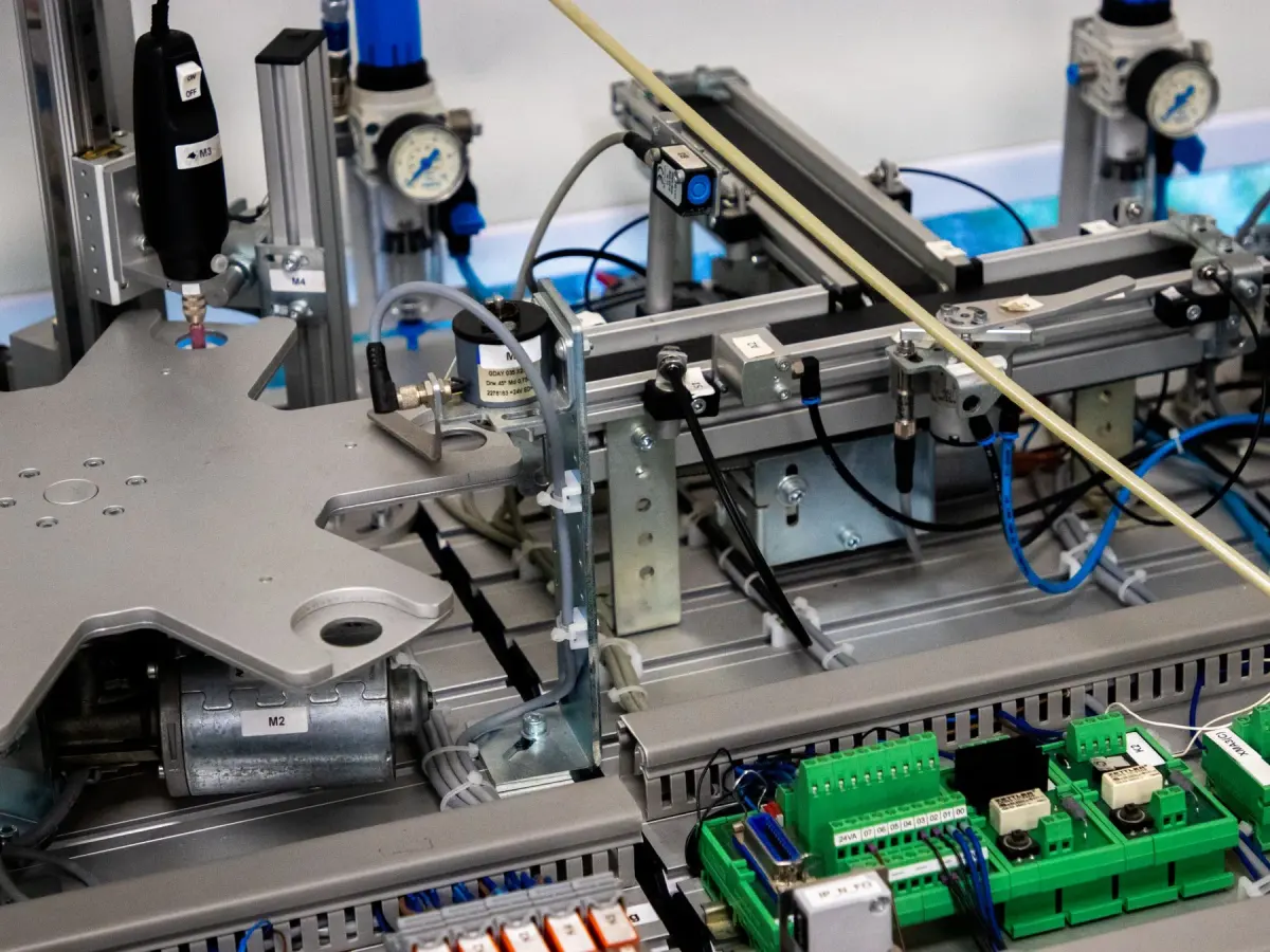 Close view of machinery with electrical wiring and electronic components