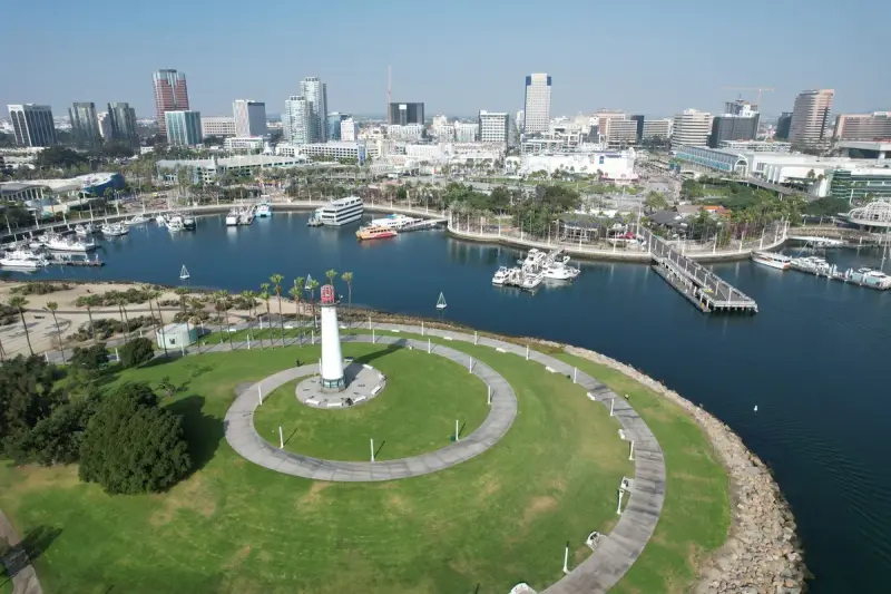 Aerial view of the downtown Long Beach skyline, marina and harbor lighthouse