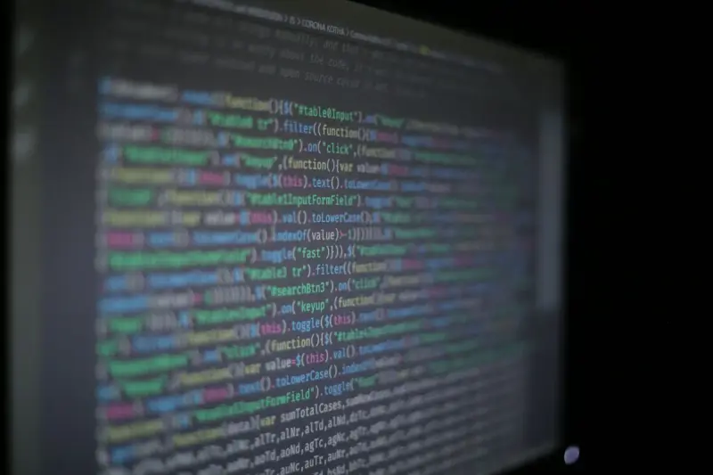 Syntax-highlighted program code on a computer monitor