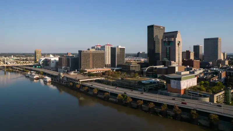 Aerial view of downtown Louisville's skyline and waterfront along the Ohio River