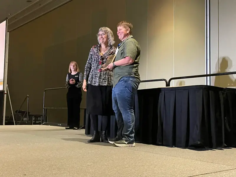 Biophysicist Sarah Veatch accepting a society award at the 2026 Biophysical Society meeting