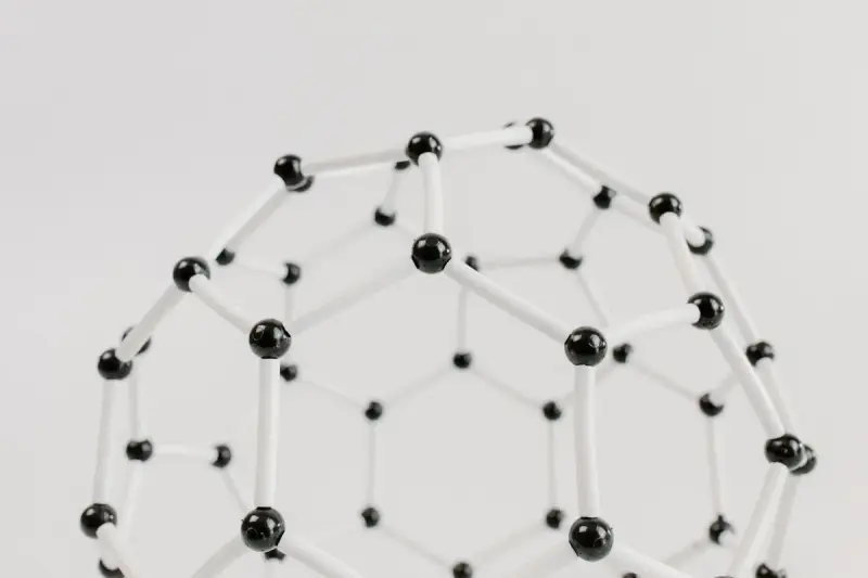 Black and white ball-and-stick model of a cage-shaped molecule