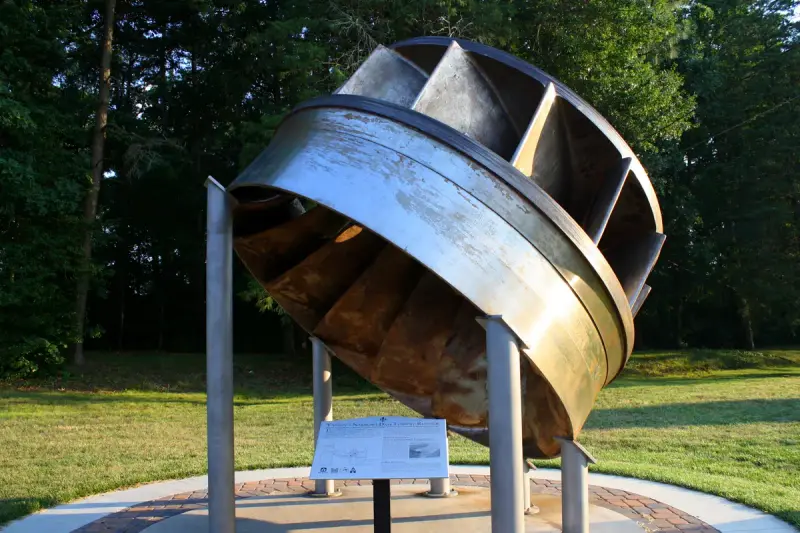 Large Francis turbine runner removed from a powerhouse and displayed outdoors