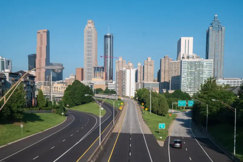 Downtown Atlanta skyscrapers above Freedom Parkway, seen from the Jackson Street Bridge on a clear day