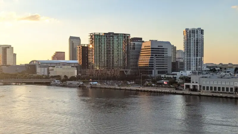 Downtown Tampa skyline reflected in the water at sunset
