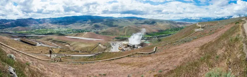 Wide view of geothermal power plants spread across the Steamboat Hills south of Reno