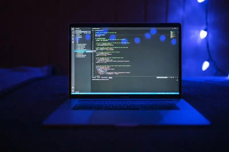 Laptop screen displaying software code