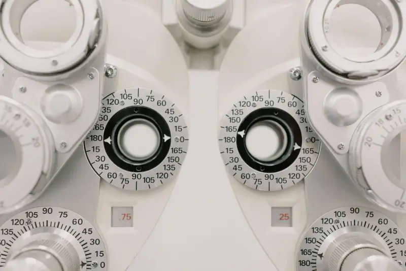 Close view of a phoropter's dials and lens wheels