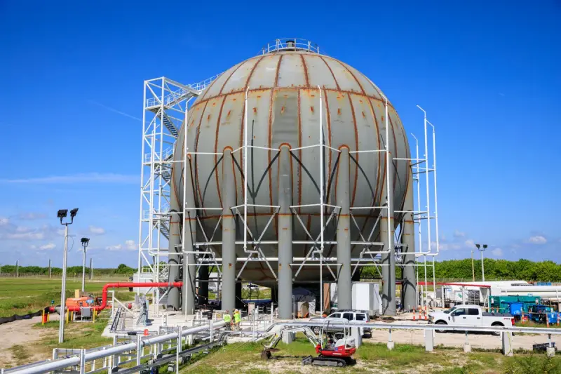 Large spherical liquid hydrogen storage tank under construction at a launch complex