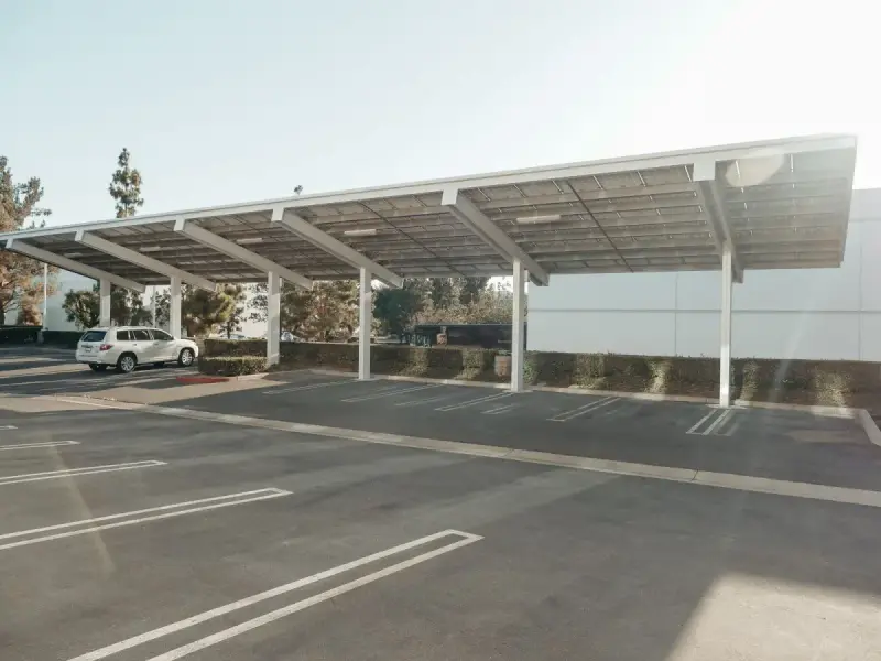 Solar canopies over a U.S. parking lot; distributed energy application reference.