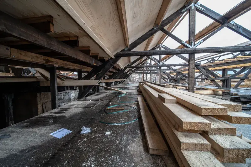 Wooden roof beams in a loft under construction