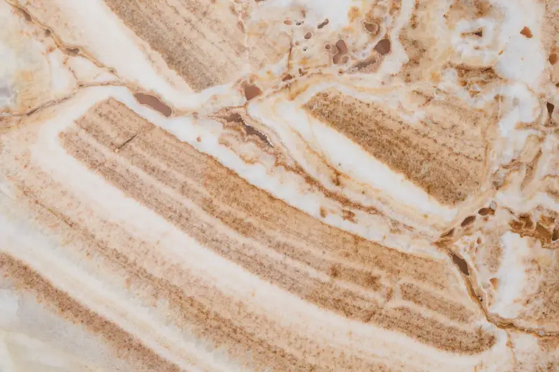 Brown and white banded stone with natural cracks