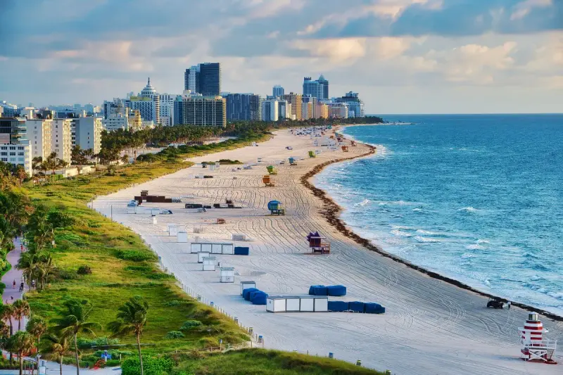 Aerial view of Miami Beach with hotels along the shore and the Atlantic Ocean