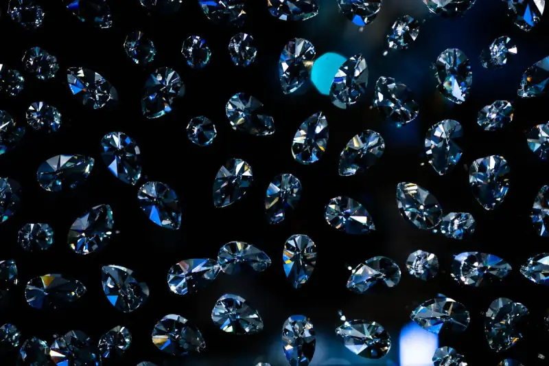 Diamonds glistening against a dark background