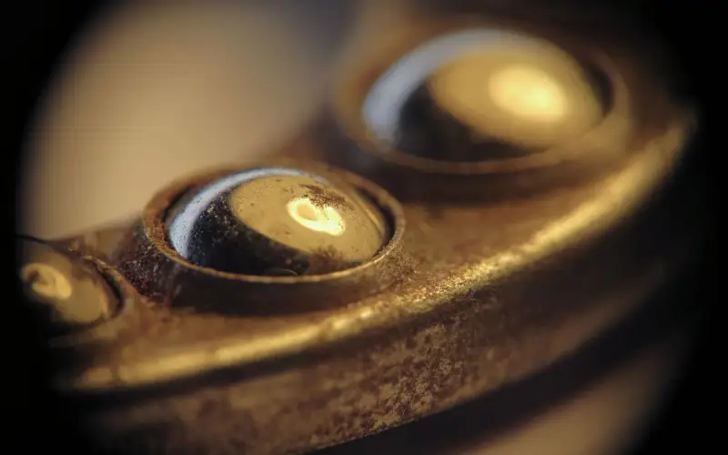 Macro view of polished steel ball bearings showing surface texture