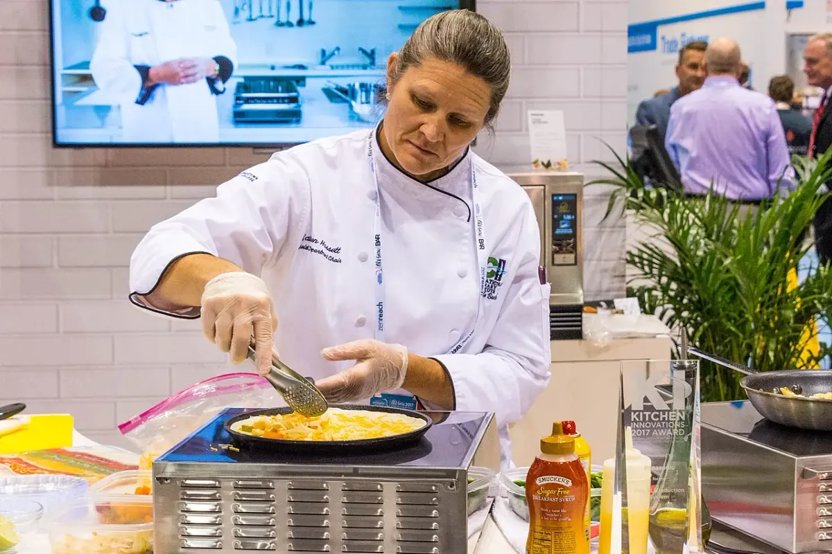 Chef demonstrating food at the National Restaurant Association Show in Chicago in 2017