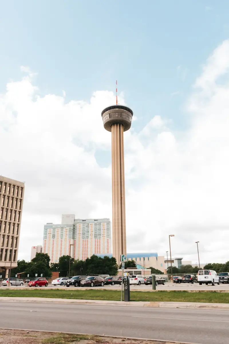 Tower of the Americas rising above the San Antonio skyline on a sunny day