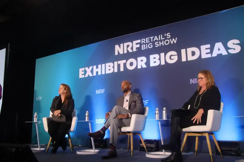 Three panelists seated on the Exhibitor Big Ideas stage under an NRF Retail's Big Show banner
