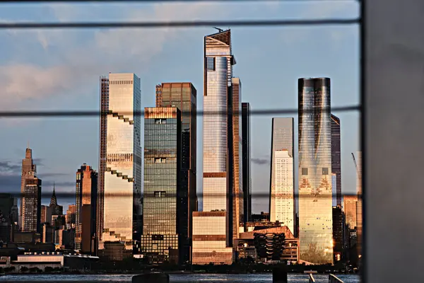 Manhattan skyline at sunset seen across the Hudson River from Weehawken