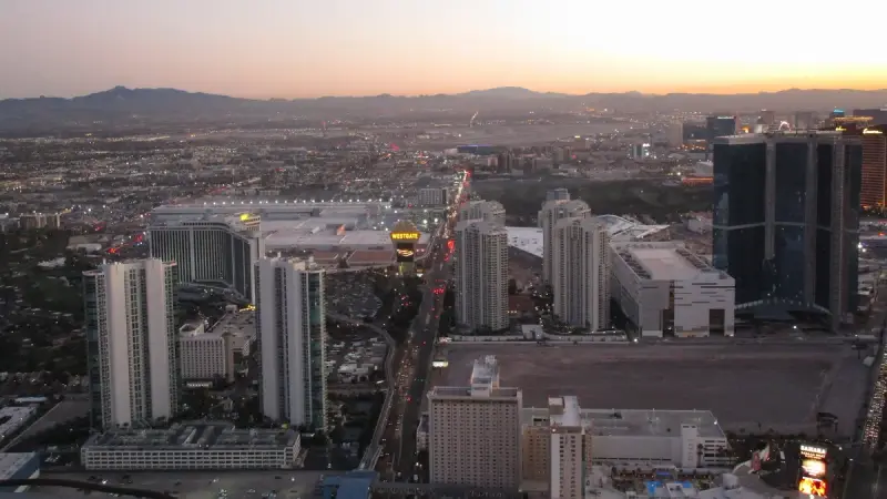 Paradise Road at dusk with the Westgate tower and the Las Vegas Convention Center
