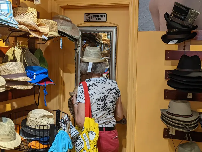 Hats stacked and hung in a French Quarter hat shop, New Orleans