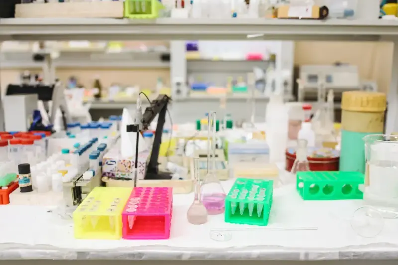 Laboratory bench with scientific equipment and sample containers