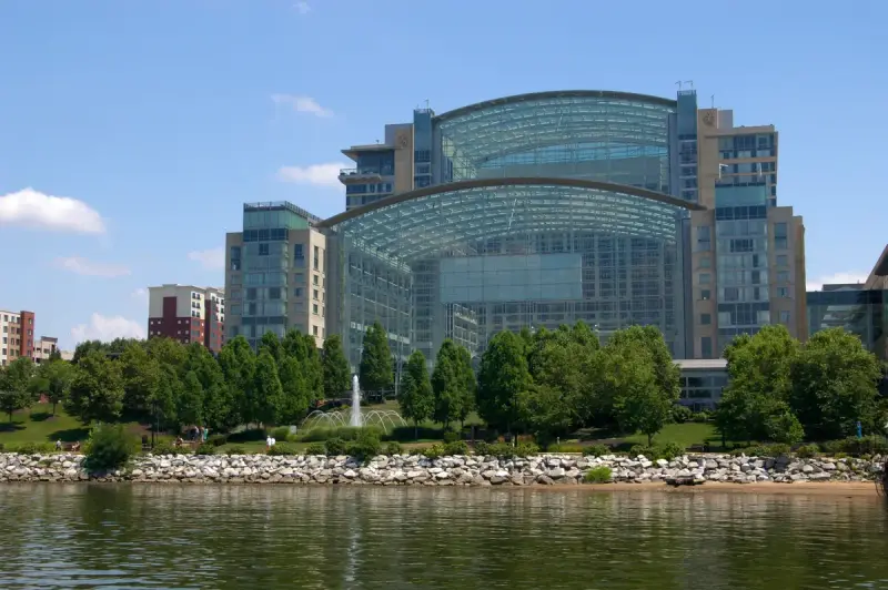 Glass atrium of the Gaylord National Resort and Convention Center seen across the Potomac River