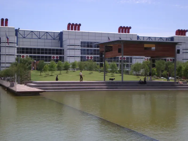 Kinder Lake in Discovery Green park, downtown Houston, with the George R. Brown Convention Center behind