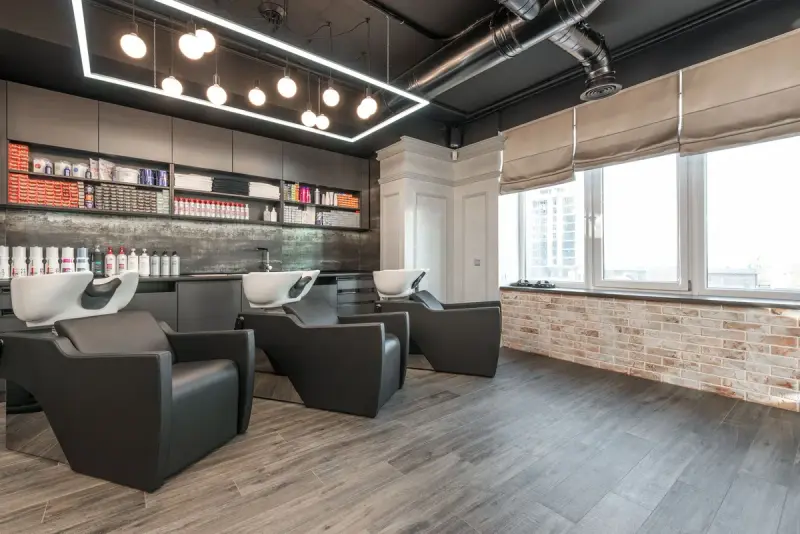 Spacious salon with backwash chairs and contemporary decor
