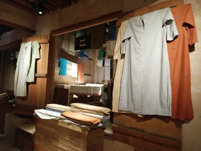 A tailor working at a traditional tailor shop