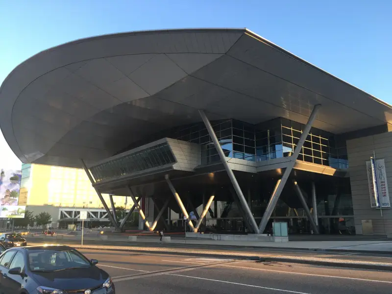 Front of the Boston Convention and Exhibition Center with its sweeping roof and angled steel columns