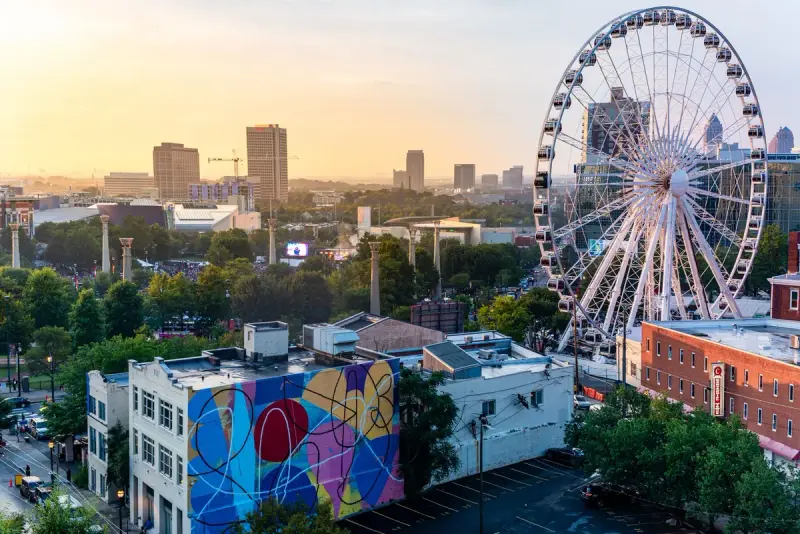 Atlanta skyline with the SkyView Ferris wheel at sunset near Centennial Olympic Park