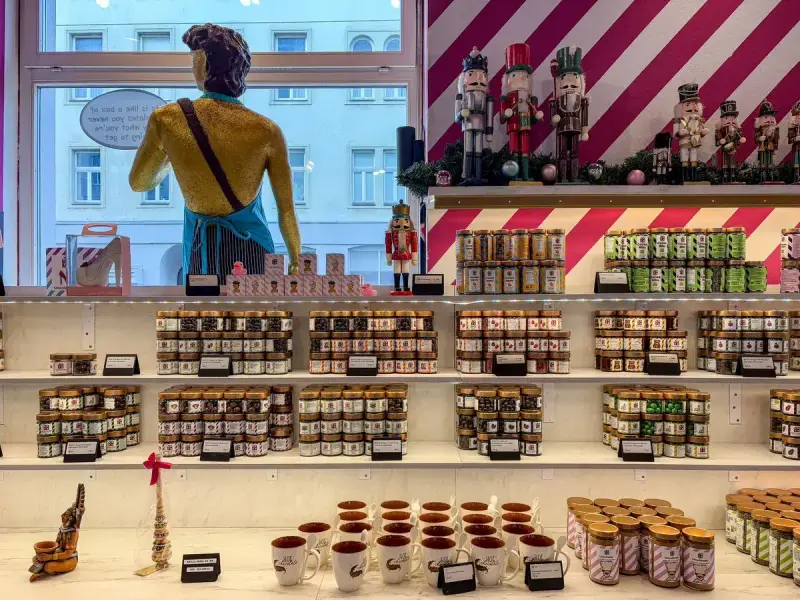 Candy shop interior decorated with nutcracker figures and boxed sweets