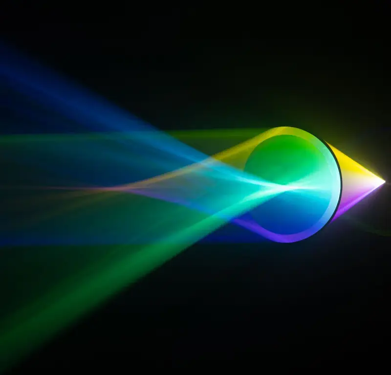 White light refracted through a glass prism into a bright color spectrum