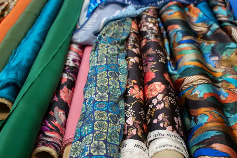 Patterned fabric rolls showing a range of textile designs