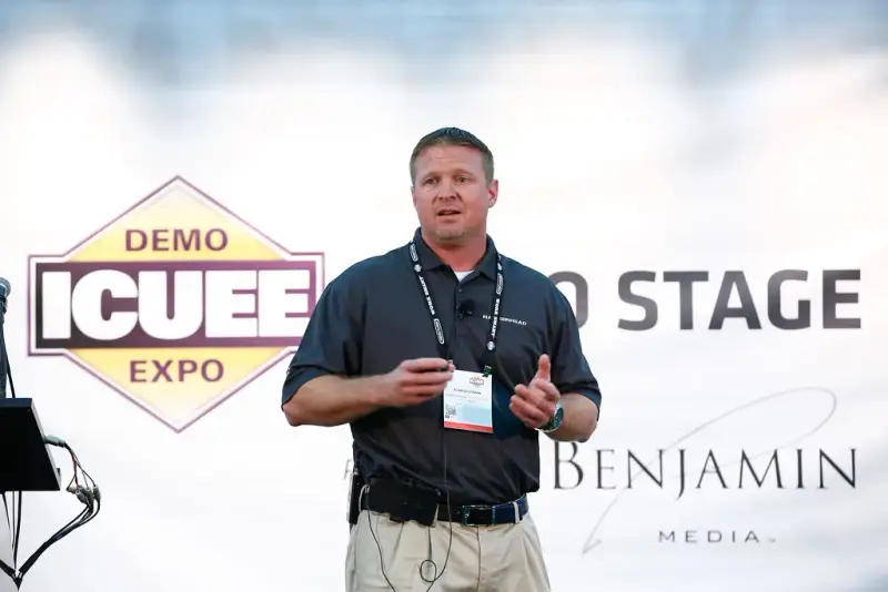 Speaker presenting on the ICUEE Demo Expo stage