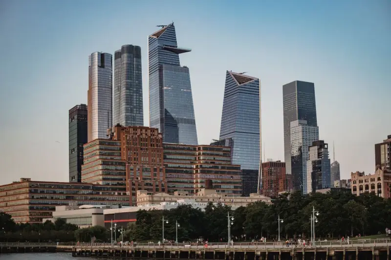 Glass towers of Hudson Yards on Manhattan's West Side against an evening sky