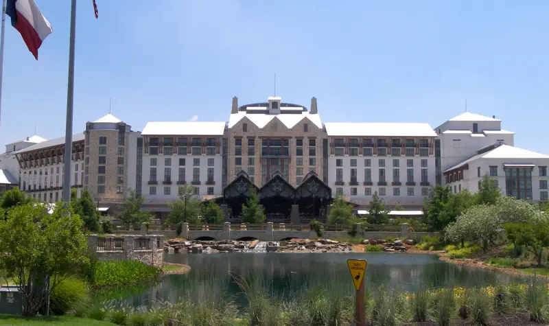 Front of the Gaylord Texan Resort and Convention Center in Grapevine, Texas, across its landscaped pond