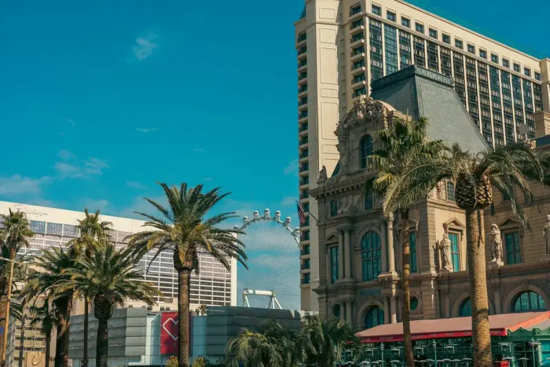 Las Vegas cityscape with resort towers and the High Roller observation wheel