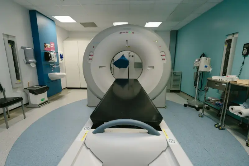 MRI scanner in a spacious hospital examination room