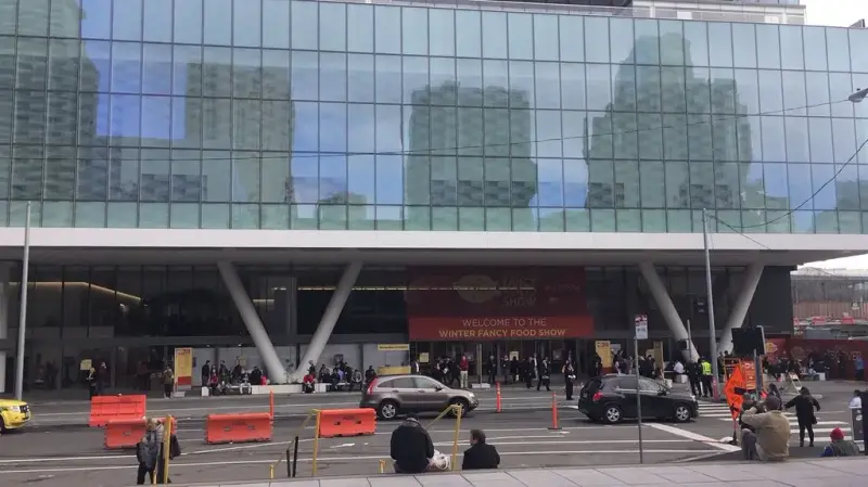 Moscone Center glass facade with a Welcome to the Winter Fancy Food Show banner over the doors