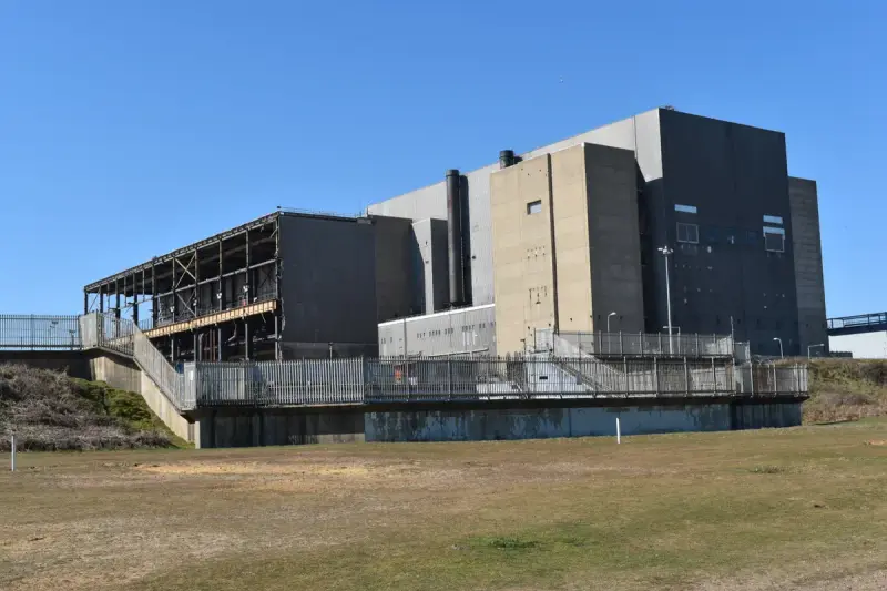Large empty reactor hall at a nuclear station being decommissioned in England
